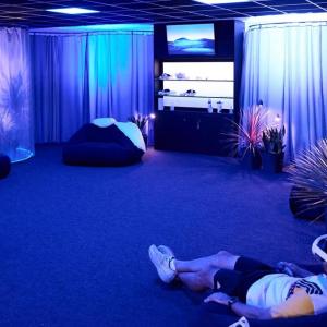 Athletes wearing VR headset in the "Mind Zone" room