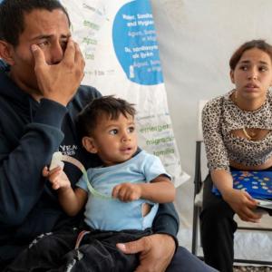 Angel José arrived at Action Against Hunger's health point in El Pescadero with his wife and two children. His baby was suffering from acute malnutrition. / Photo by Gonzalo Höhr