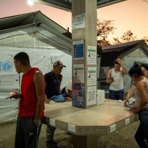 The Temporary Rest Center in Trojes, Honduras, Action Against Hunger teams connect families with lifesaving support.  / Photo by Gonzalo Höhr