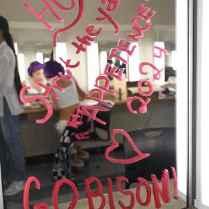 lipstick written on mirror