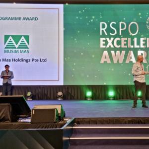 award recipients standing on stage 