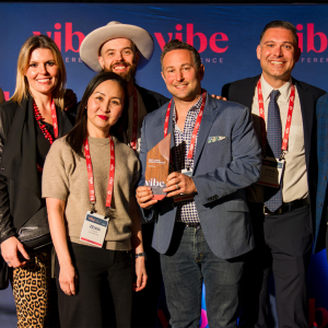A group holding an award