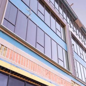 A multi-story building under construction.