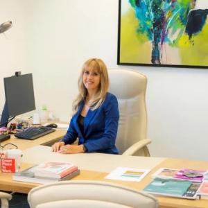 Nicoletta Luppi sitting at a desk