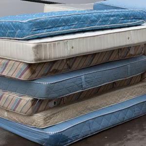 Piles of old mattresses