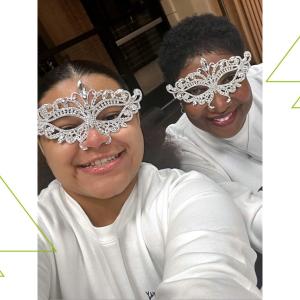 Sophia and a child wearing sparkly glasses