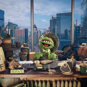 Oscar sitting at his desk