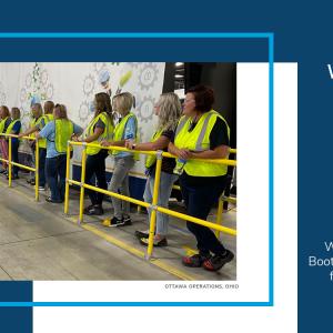 Teachers lined up in yellow vests 