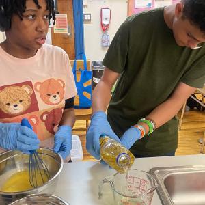 people working in a kitchen