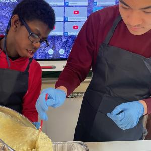 people working in a kitchen