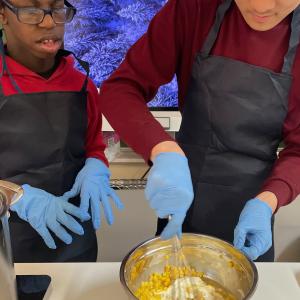people working in a kitchen