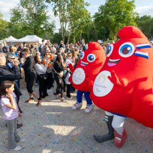 mascots with a crowd
