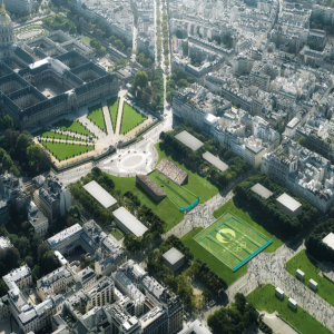 Aerial view of a large palace with courtyards in a city.
