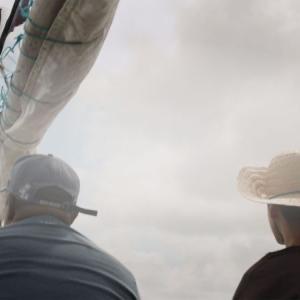 two people on a boat