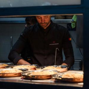person preparing food at restaurant