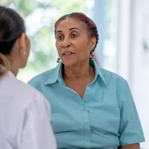 A patient talking to a medical provider.