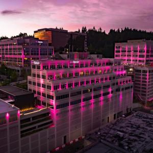 T-Mobile office building at dusk with pink exterior lighting