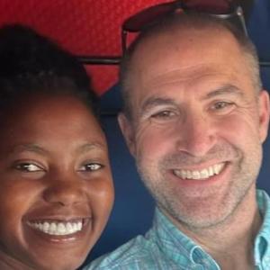 two people next to each other smiling