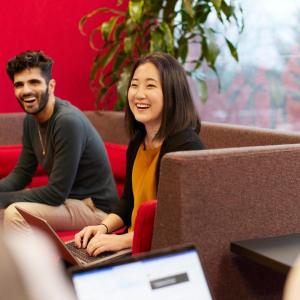 people sitting together and working
