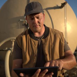person working on a dairy farm