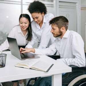 coworkers at a computer