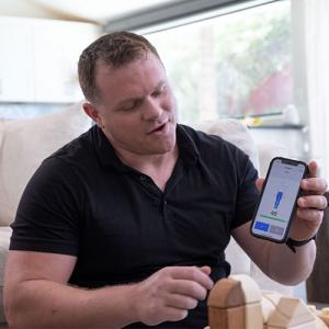 person holding up a smart phone