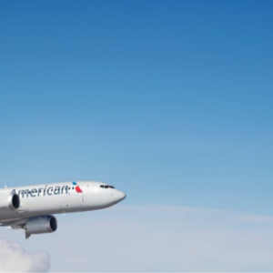 plane in flight above the clouds