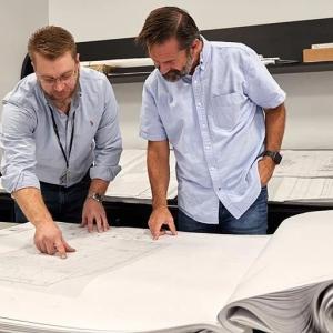 people looking at plans