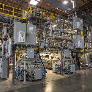 interior on a large plant, piping, walkways, equipment.