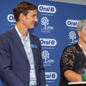 Benjamin Binot and Alison Dougall at a podium
