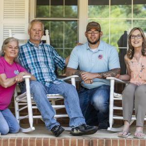Sgt. David Long and family members on the front porch