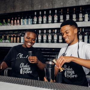 two men behind the bar