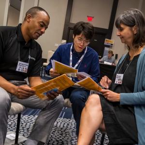 Entergy employees participating in a poverty simulation.