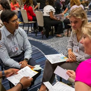 Entergy employees participating in a poverty simulation.