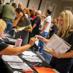 Entergy employees participating in a poverty simulation.