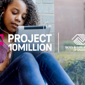 A child wearing headphones on a tablet device 