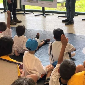 Students raising their hands
