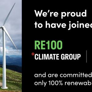Wind turbines with text: We're proud to have joined RE100 Climate Group and are committed to using only 100% renewable electricity