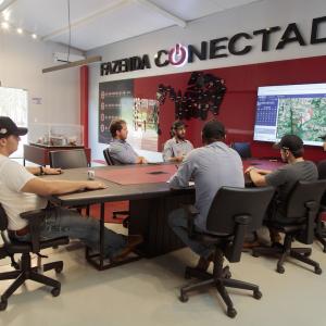 people sitting together around a conference table