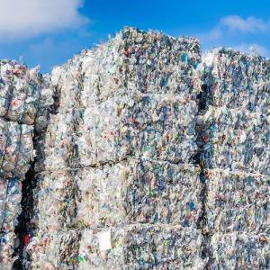 Stacks of bailed plastics for recycling.