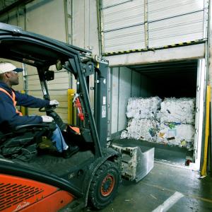 A person using a forklift 