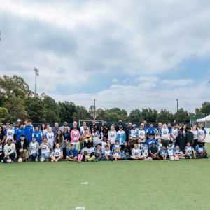 Athletes, families, LA Galaxy staff, and community partners gather for a group photo during the LA Galaxy Foundation Youth Adaptive Sports Program, which expands access to soccer and creates inclusive opportunities for youth athletes.