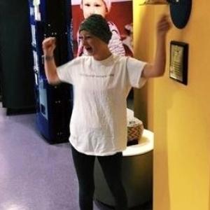 Katie Rutherford ringing the cancer bell.