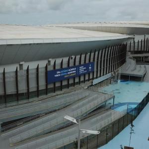 Aerial view of the exterior of a large stadium