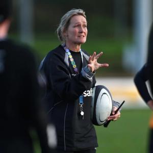 rugby coach talking to athletes