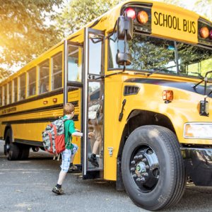 child entering a school bus