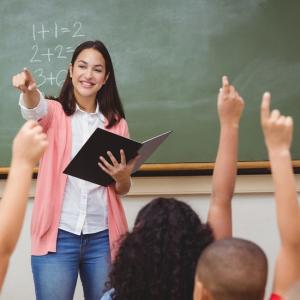 teacher in front of classroom