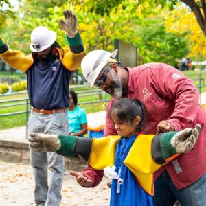 Trying on line worker gear