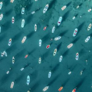 Aerial view of many boats on water