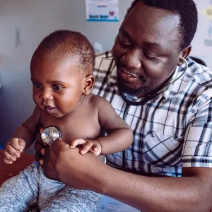 A young patient is seen at Kisenyi Health Center in Kampala, Uganda. The health center is supported by donated medical aid from Direct Relief. (Photo by David Uttley for Direct Relief)